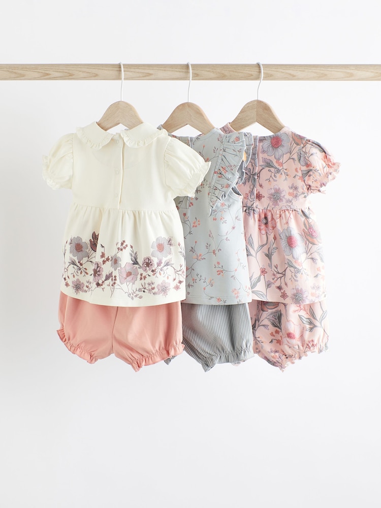Pink/Weiß mit Blumenmuster - 3er-Pack für Babys bestehend aus T-Shirt und Shorts aus 100 % Baumwolle - Bild 2 von 8