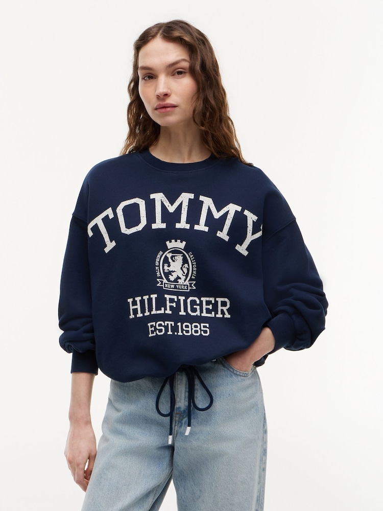 Tommy Hilfiger Blue Crest Logo Drawstring Hem Relaxed Sweatshirt - Image 1 of 5 Tommy Hilfiger Blue Crest Logo Drawstring Hem Relaxed Sweatshirt - Image 1 of 5
