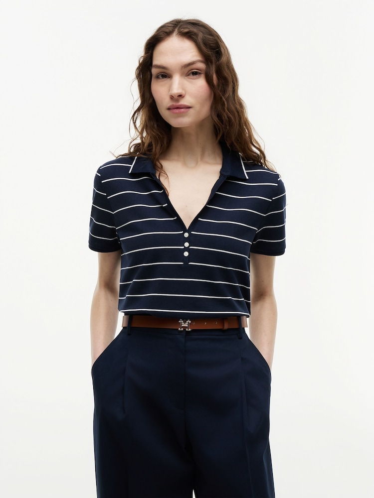 Tommy Hilfiger Blue Regular Fit Pique Henley Polo Shirt - Image 1 of 5 Tommy Hilfiger Blue Regular Fit Pique Henley Polo Shirt - Image 1 of 5