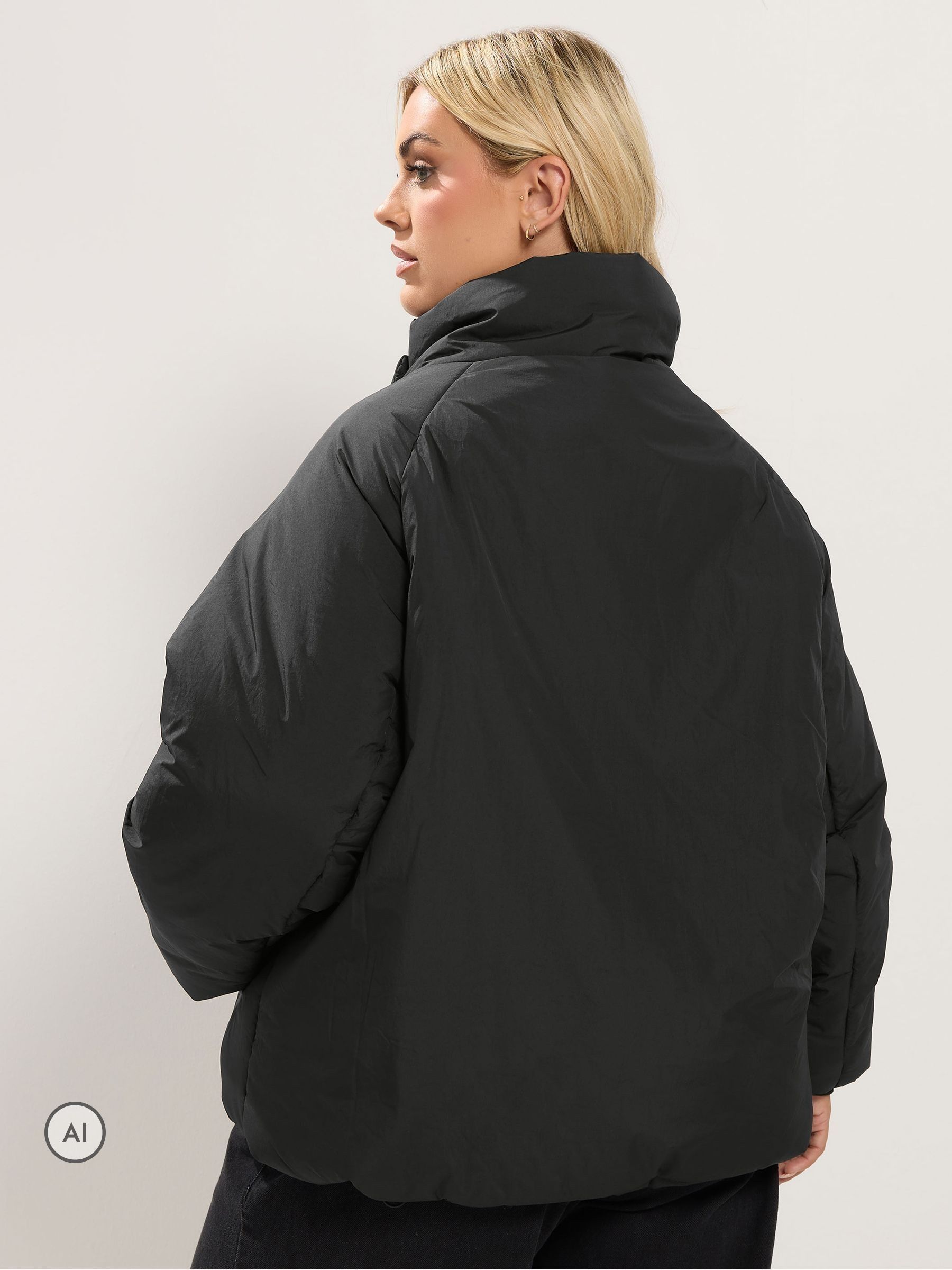 Buy Yours Curve Black Asymmetric Zip Short Padded Jacket from Next USA