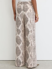 Reiss Ivory/Grey Elyna Snake-Print Flared-Leg Trousers - Image 6 of 7