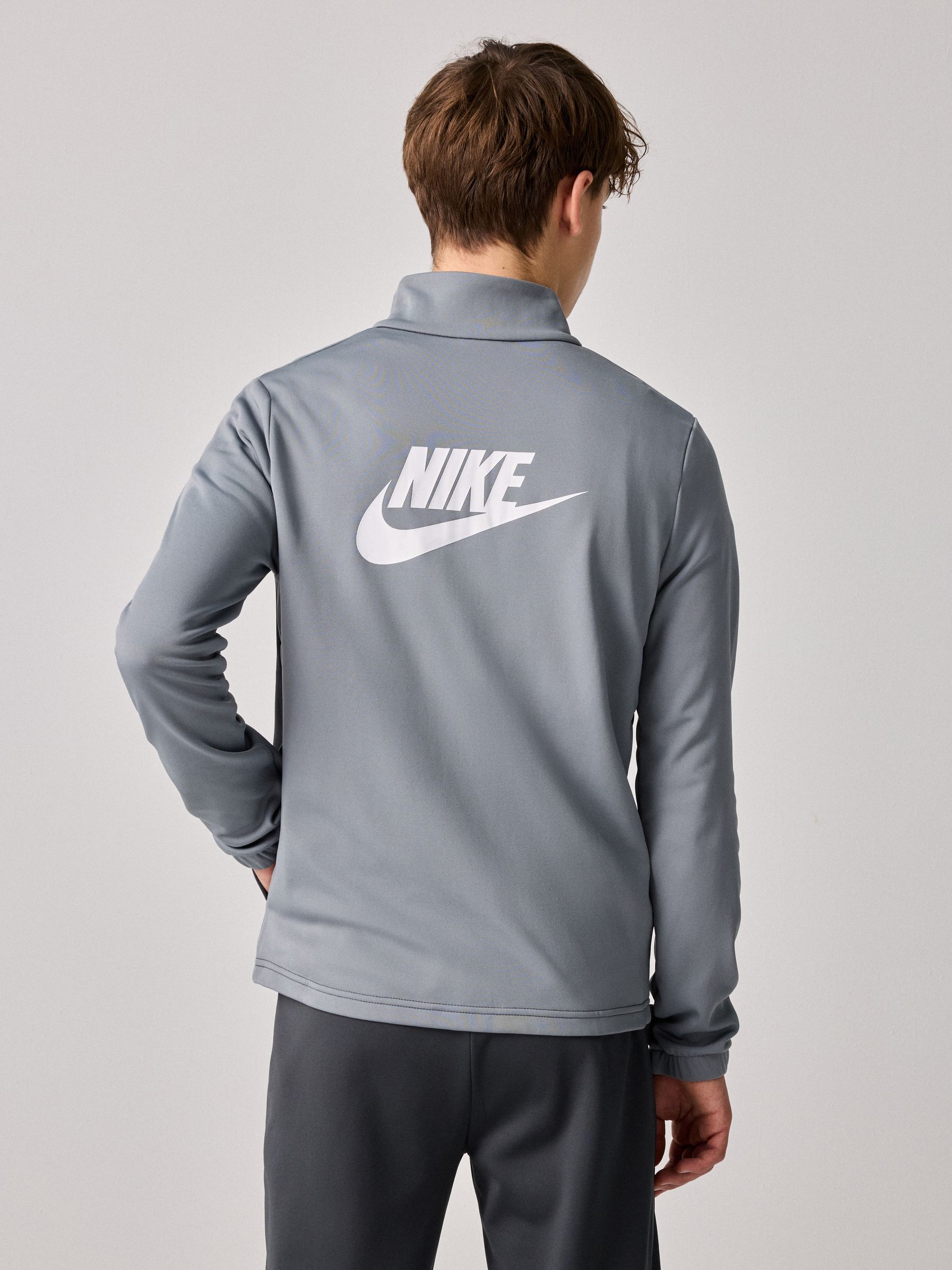 grey nike sportswear tracksuit