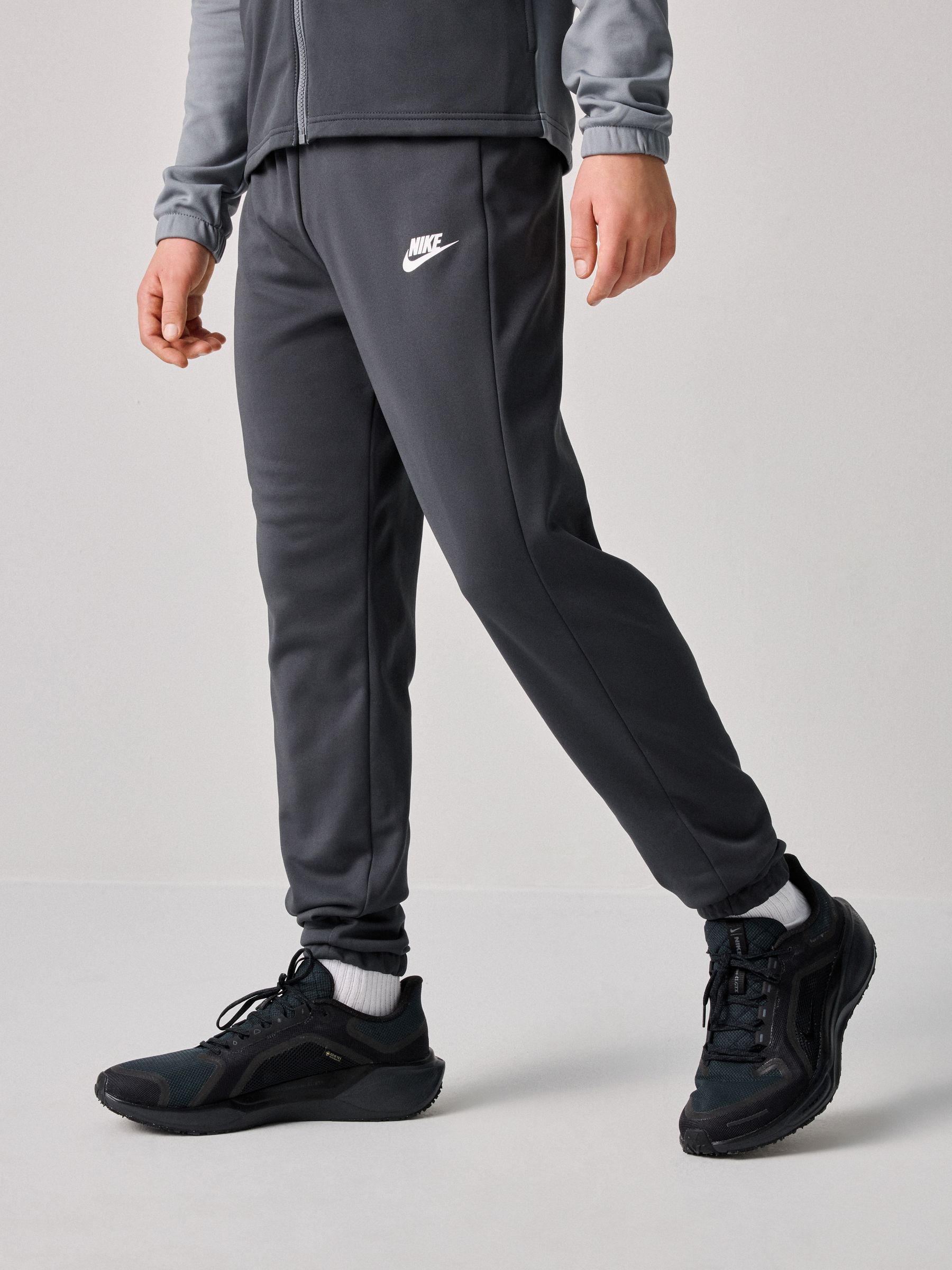 nike joggers with zips