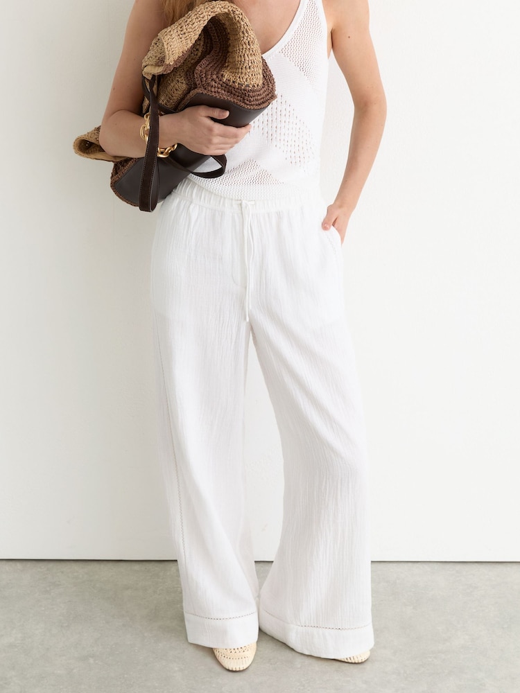 Reiss White Rue Petite Cotton Cheesecloth Wide-Leg Trousers - Image 1 of 8 Reiss White Rue Petite Cotton Cheesecloth Wide-Leg Trousers - Image 1 of 8