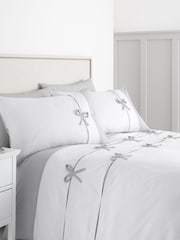 Catherine Lansfield White/Silver Milo Bow Duvet Cover Set - Image 1 of 4