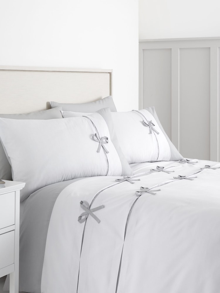 Catherine Lansfield White/Silver Milo Bow Duvet Cover Set - Image 1 of 4
