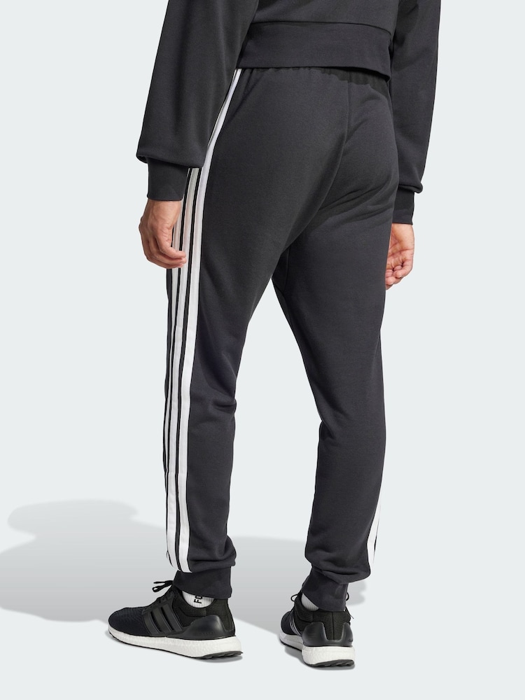 adidas Black Essential 3-Stripes French Terry Joggers - Image 1 of 5 adidas Black Essential 3-Stripes French Terry Joggers - Image 1 of 5