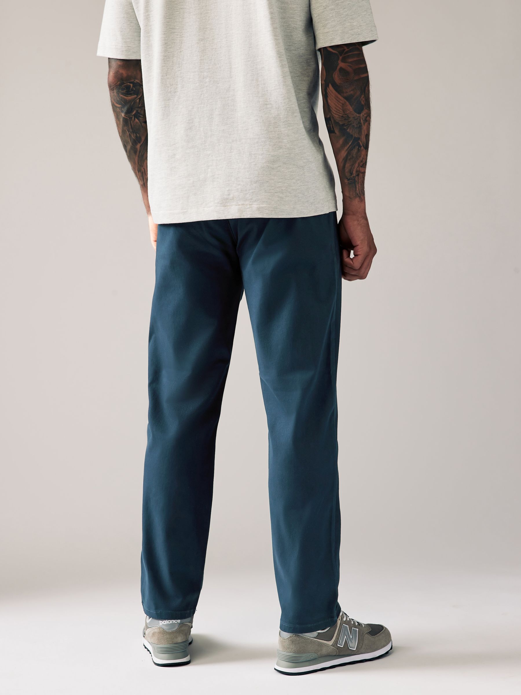 Buy Blue Dark Straight Fit Stretch Chinos Trousers from Next USA