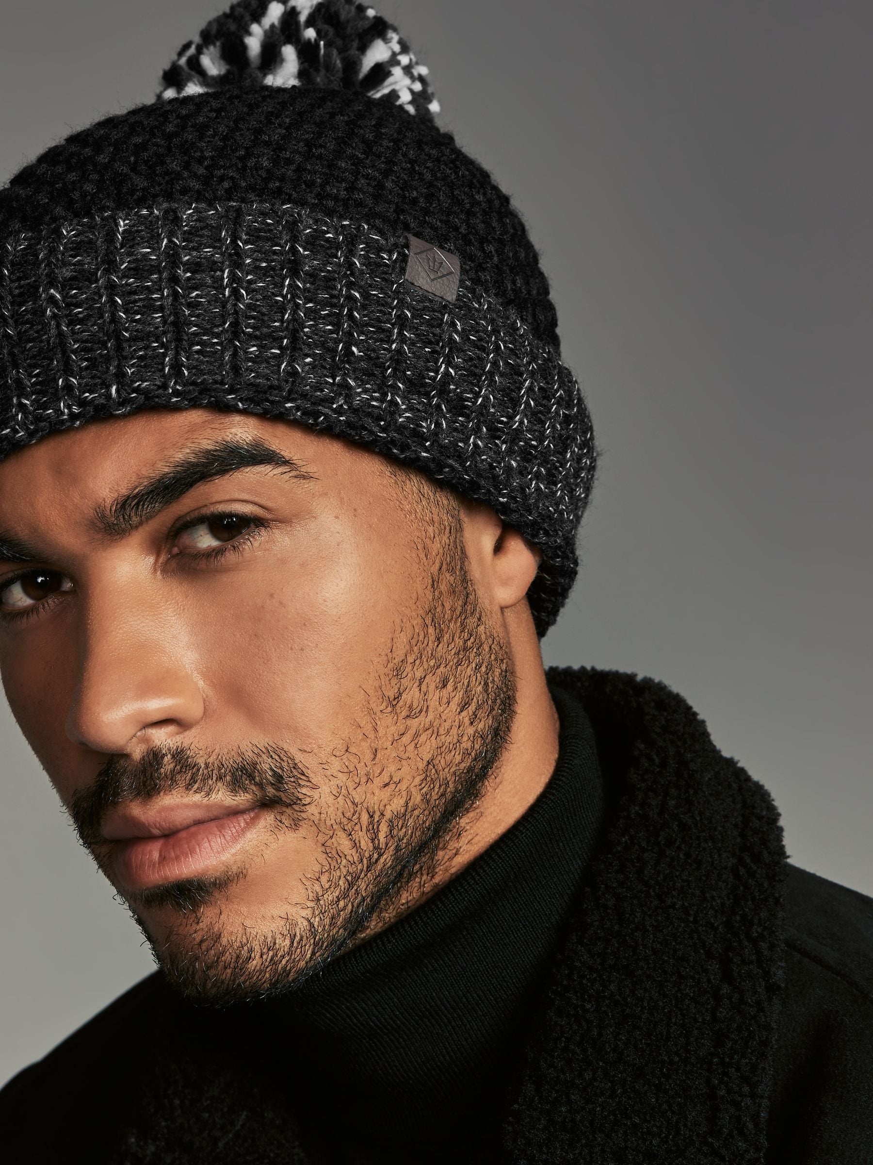 Buy Black White Textured Lined Bobble Hat from the Next UK online shop