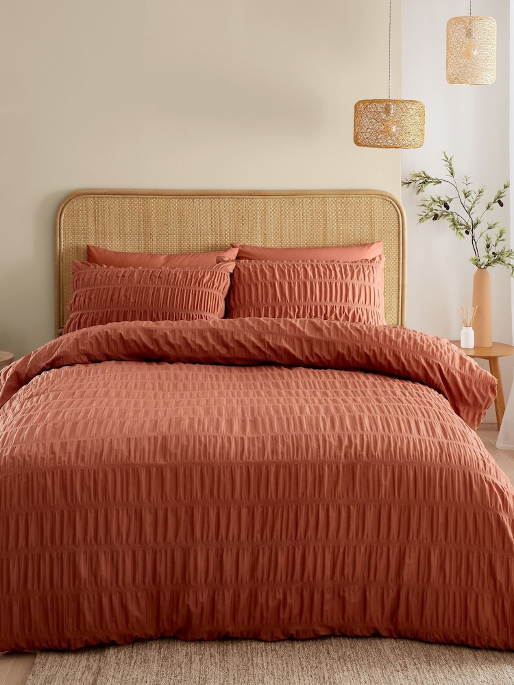 Catherine Lansfield Orange Seersucker Easy Care Duvet Cover Set - Image 1 of 4