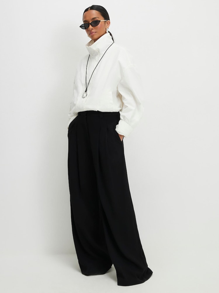River Island Black Petite Pleated Wide Leg Trousers - Image 1 of 4
