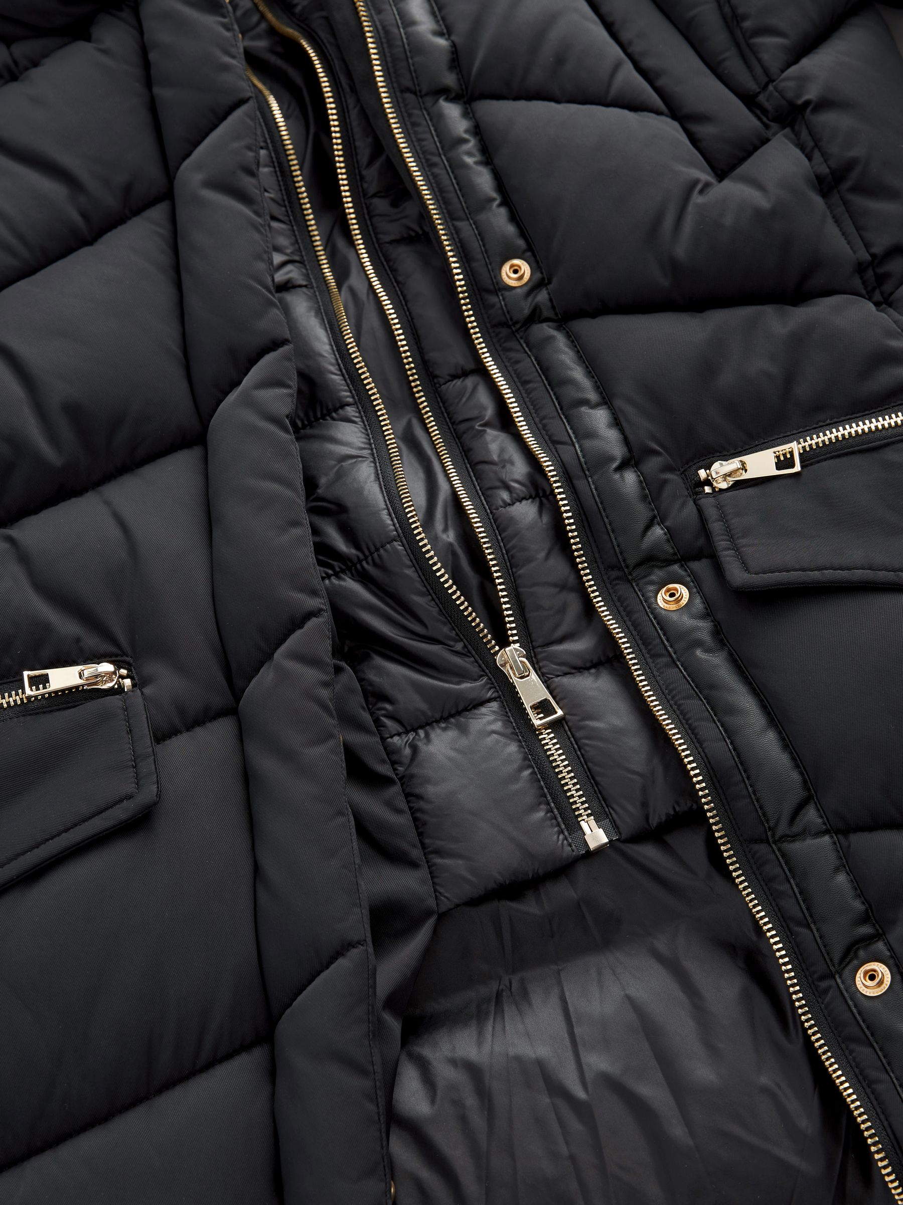 Black puffer coat with gold zipper discount