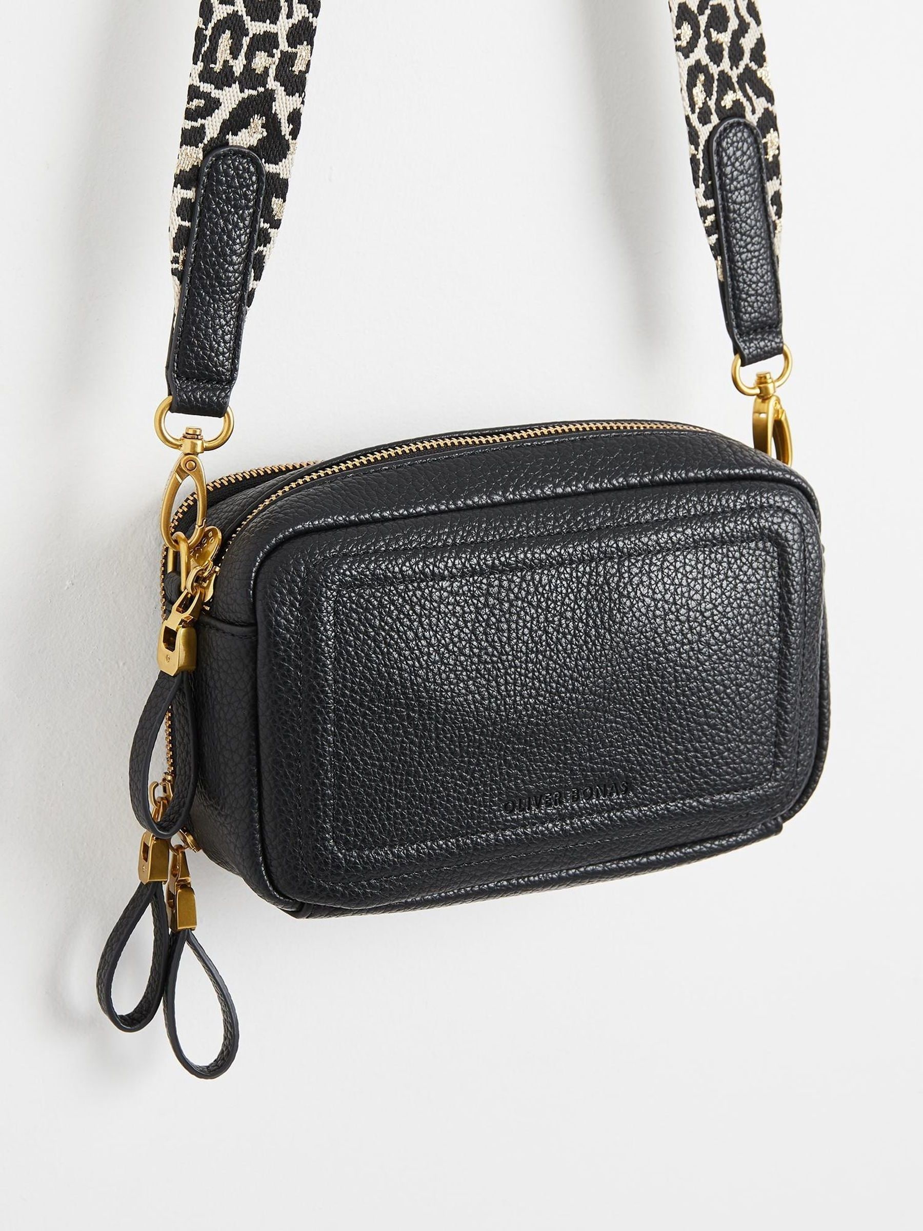 Buy Oliver Bonas Black Leopard Print Strap Simen Cross Body Bag from Next Ireland