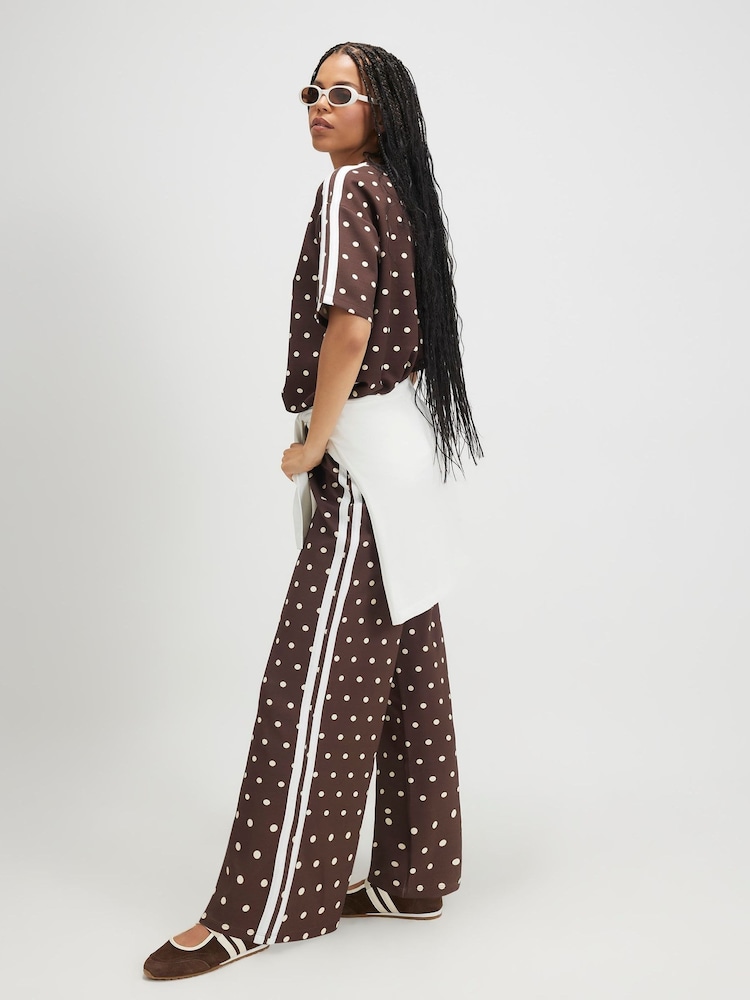 River Island Brown Polka Dot Neoprene Tape Trousers - Image 1 of 4