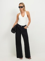 Vaqueros rectos holgados para talla Petite de River Island - Imagen 1 de 4