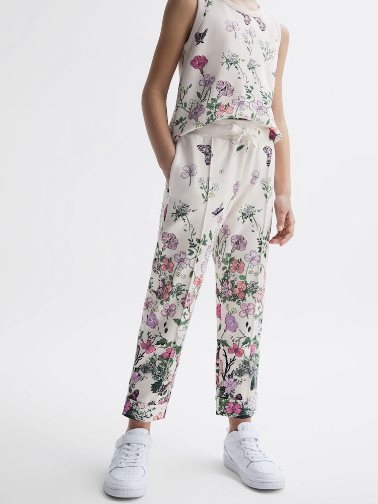 Reiss Pink Print Kemi 4-9 yrs Floral Print Drawstring Joggers - Image 1 of 6 Reiss Pink Print Kemi 4-9 yrs Floral Print Drawstring Joggers - Image 1 of 6