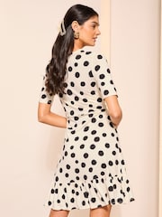 Friends Like These Black/White Print Short Sleeve Ruffle Hem Jersey Mini Dress - Image 4 of 5