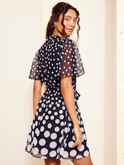 Friends Like These Navy Blue Petite Chiffon Flutter Sleeve with Self Tie Belt Dress - Image 4 of 4