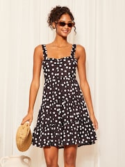 Friends Like These Black/White Polka Dot Strappy Tiered Mini Dress - Image 1 of 4