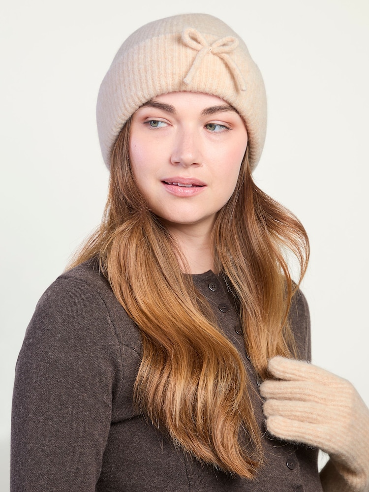 Totes Natural Wool Blend Knitted Beanie Hat with Bow - Image 1 of 3 Totes Natural Wool Blend Knitted Beanie Hat with Bow - Image 1 of 3