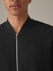 Schwarz - Strukturierte Jersey-Bomberjacke - Bild 6 von 11
