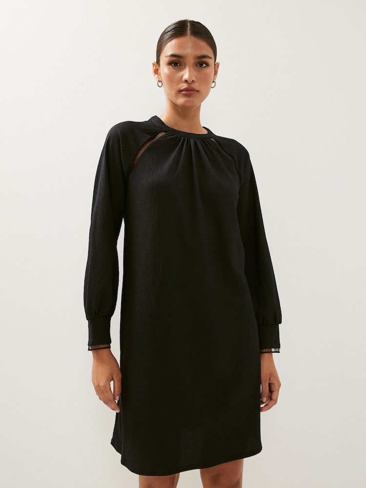 Schwarz - Langärmeliges Minikleid mit Leiterdetail - Bild 1 von 5