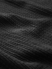 Schwarz - Langärmeliges Minikleid mit Leiterdetail - Bild 5 von 5