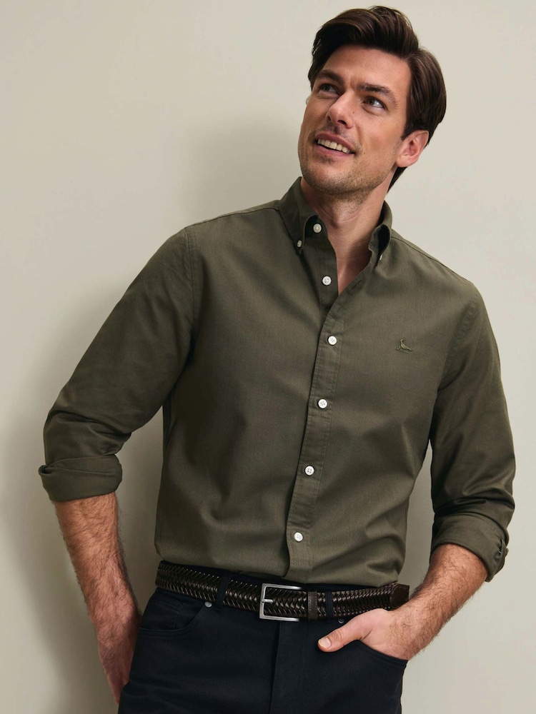 Charles Tyrwhitt Dark Green Regular Fit Plain Button-Down Stretch Washed Oxford Shirt - Image 1 of 7 Charles Tyrwhitt Dark Green Regular Fit Plain Button-Down Stretch Washed Oxford Shirt - Image 1 of 7