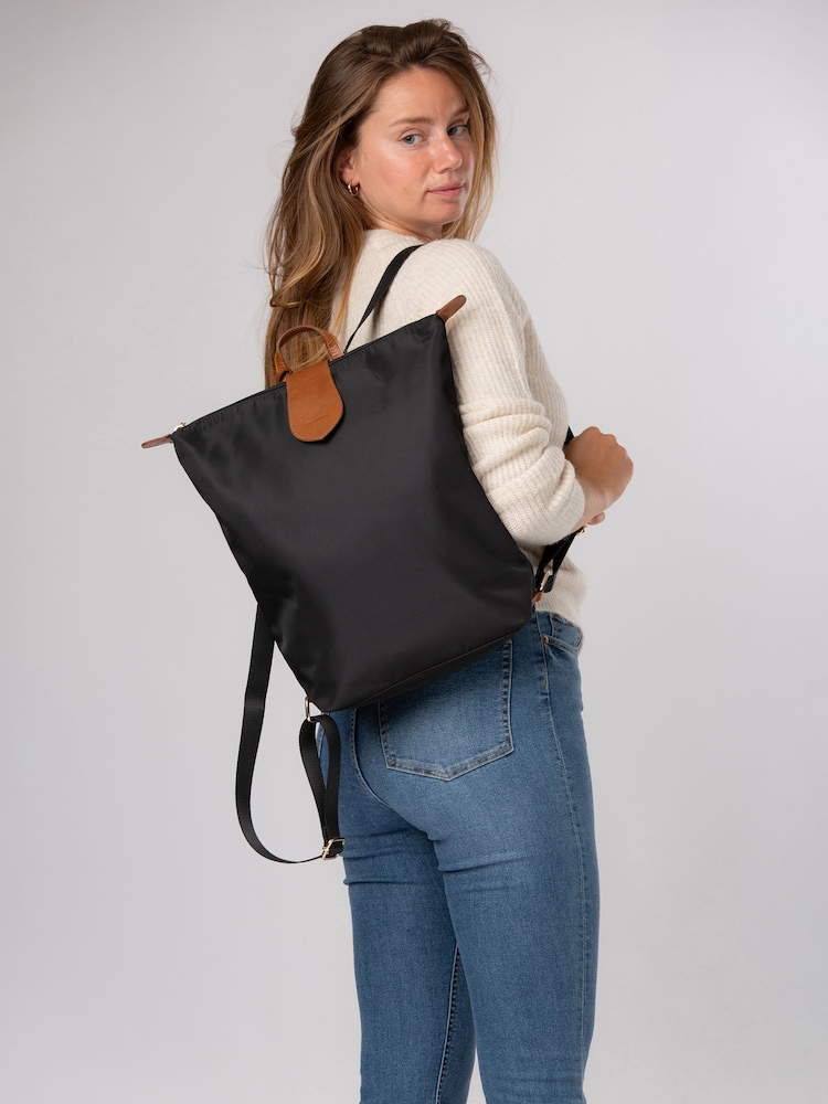 Pure Luxuries London Black/Brown 'Louison' Canvas & Leather Backpack - Image 1 of 6 Pure Luxuries London Black/Brown 'Louison' Canvas & Leather Backpack - Image 1 of 6