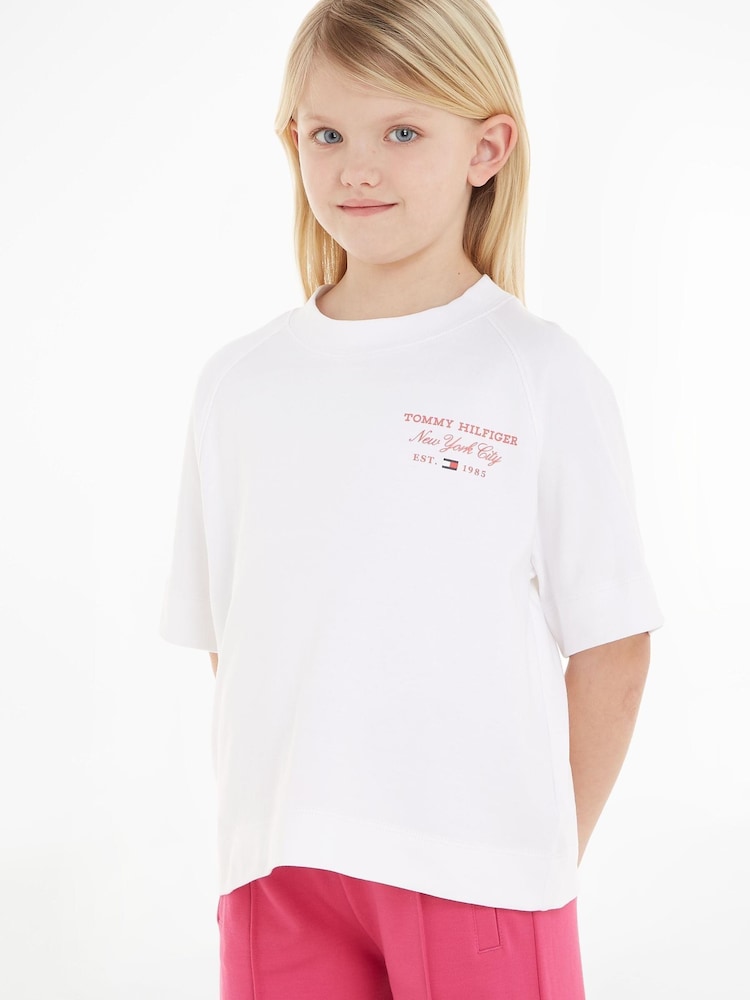 Bela majica s kratkimi rokavi in napisom Tommy Hilfiger Kids - Slika 1 iz 6