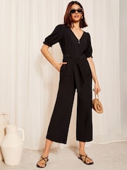 Friends Like These Black Petite Puff Sleeve Zip Front Tie Waist Jumpsuit - Image 1 of 4
