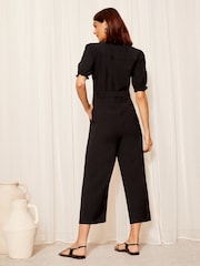 Friends Like These Black Petite Puff Sleeve Zip Front Tie Waist Jumpsuit - Image 4 of 4