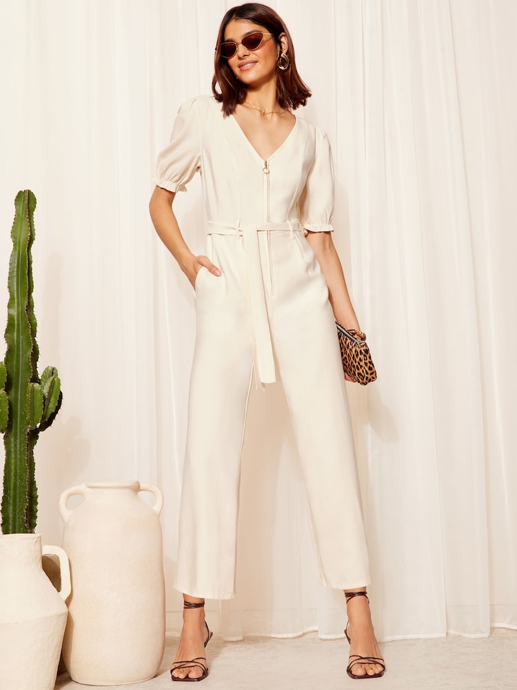 Friends Like These Cream Petite Puff Sleeve Zip Front Tie Waist Jumpsuit - Image 1 of 4