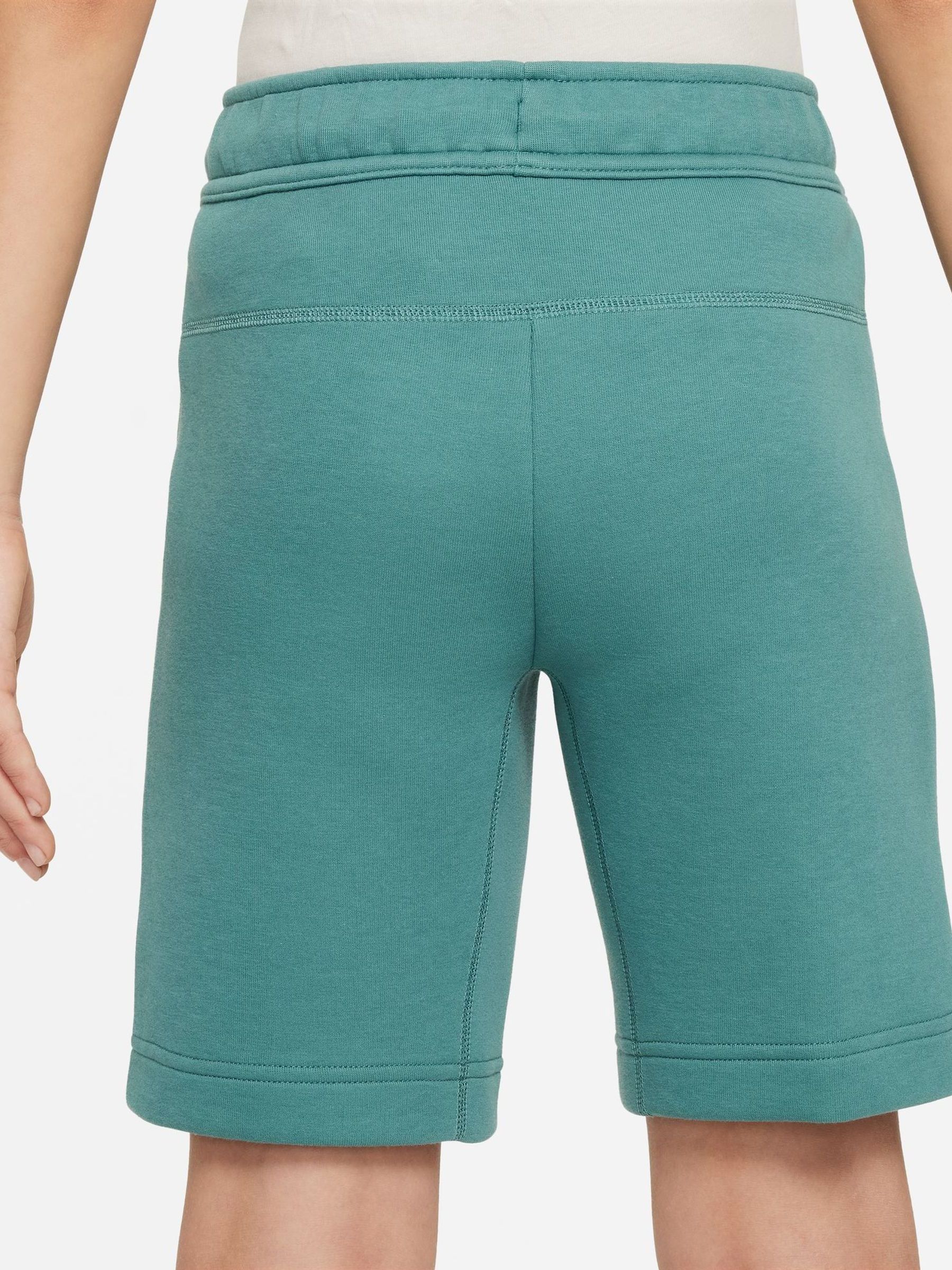 Buy Nike Green Tech Fleece Shorts from Next Denmark