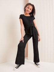 Lipsy Black Crinkle Texture Jersey Trim Crew Neck Jumpsuit (5-16yrs) - Image 1 of 4