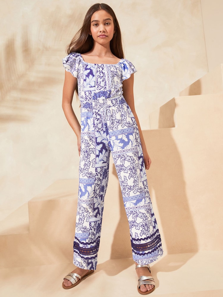 Lipsy Blue Print Square Neck Crinkle Jersey Jumpsuit (5-16yrs) - Image 1 of 4 Lipsy Blue Print Square Neck Crinkle Jersey Jumpsuit (5-16yrs) - Image 1 of 4