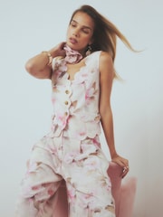 River Island Gilet en mélange de lin à imprimé fleuri sans manches avec ourlet festonné - Image 1 de 4