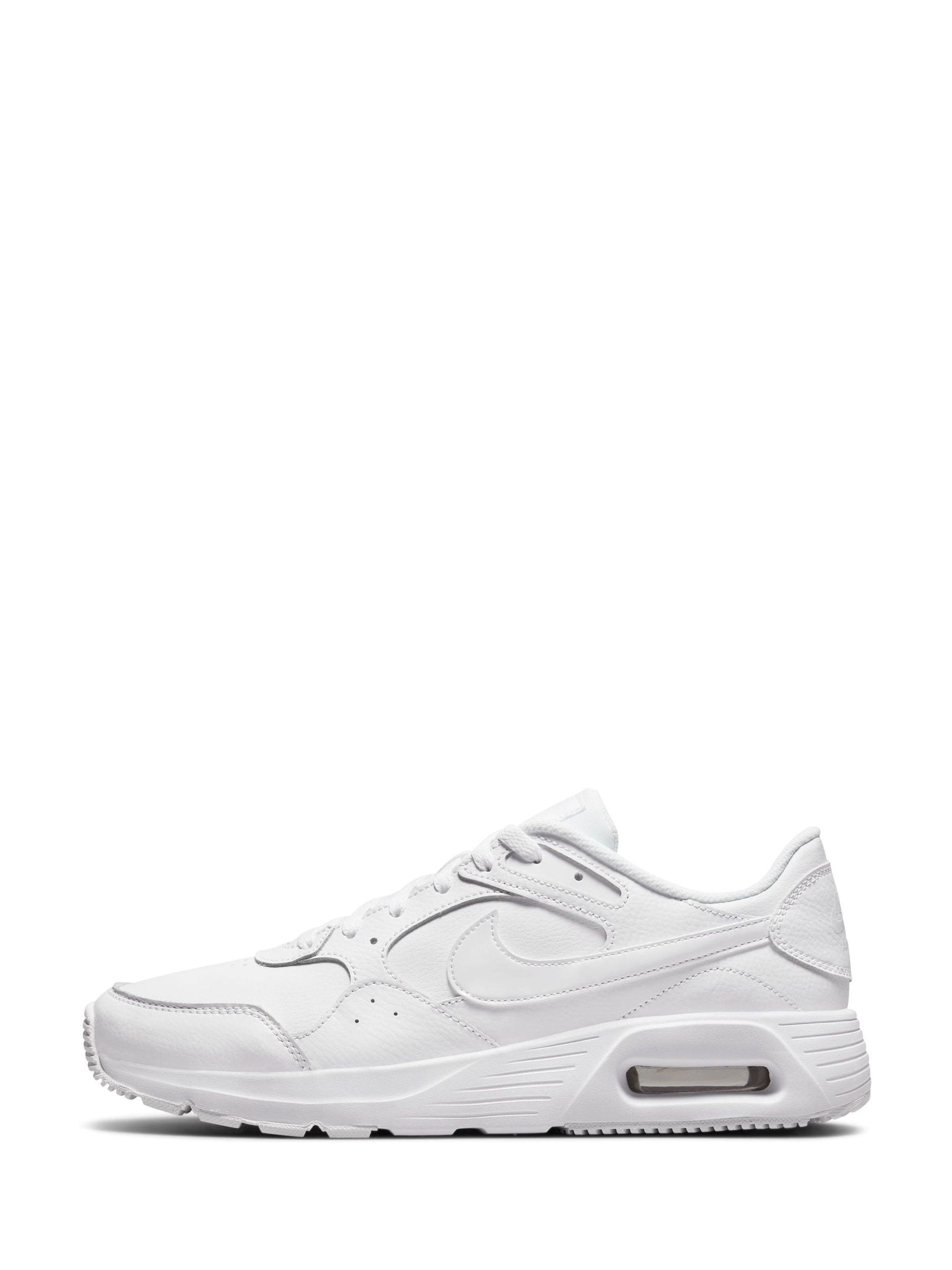 Nike white leather trainers womens hot sale