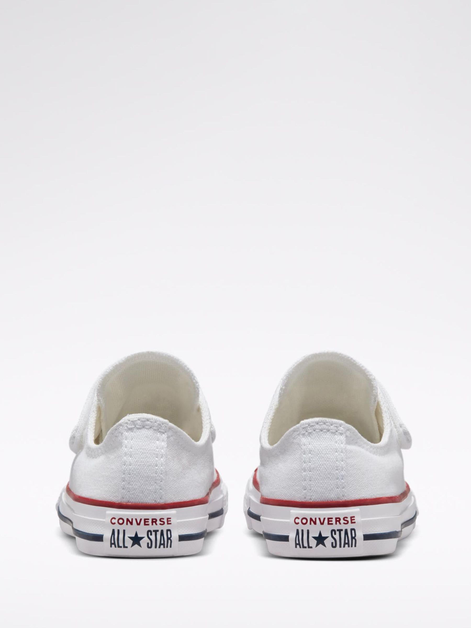 Buy Converse White 1V Chuck Ox Junior Trainers from Next USA