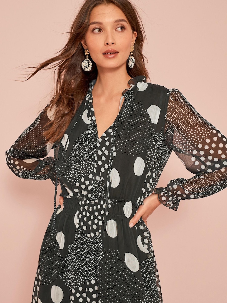 Schwarz/Weiß gepunktet - Langärmeliges Midi-Kleid aus Chiffonmix - Bild 1 von 5