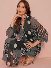 Schwarz/Weiß gepunktet - Langärmeliges Midi-Kleid aus Chiffonmix - Bild 3 von 5