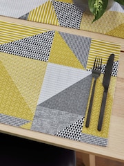 Catherine Lansfield Set of 2 Yellow Larsson Geo Wipeable 100% Cotton Placemats - Image 1 of 4