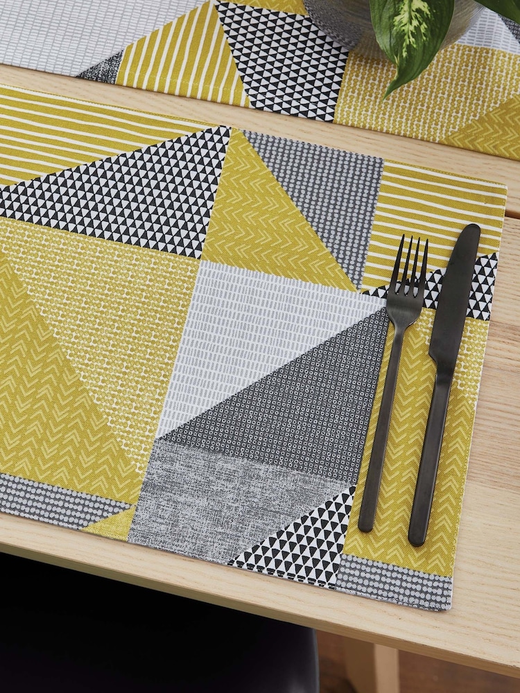 Catherine Lansfield Set of 2 Yellow Larsson Geo Wipeable 100% Cotton Placemats - Image 1 of 4