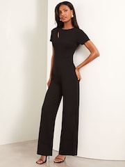 Lipsy Black Petite Splice Detail Short Sleeve Wide Leg Jumpsuit - Image 3 of 4