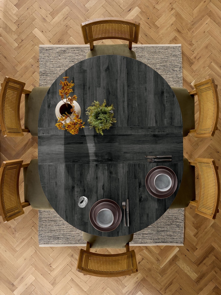 Black Bronx 4 to 6 Seater Extending Round Dining Table - Image 1 of 9