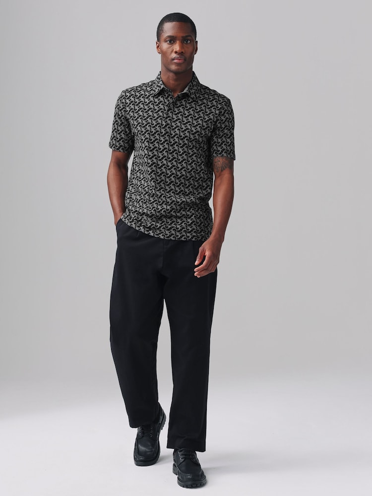 Fische, Schwarz - Kurzärmeliges Polo-Shirt mit Print - Bild 2 von 8 Fische, Schwarz - Kurzärmeliges Polo-Shirt mit Print - Bild 2 von 8