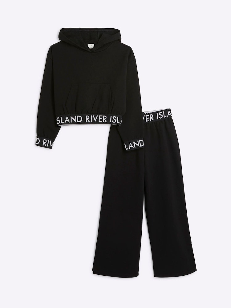 أسود - طقم من هودي وبنطلون رياضي من القطن 100% للبنات من River Island - صورة 1 من 1 أسود - طقم من هودي وبنطلون رياضي من القطن 100% للبنات من River Island - صورة 1 من 1