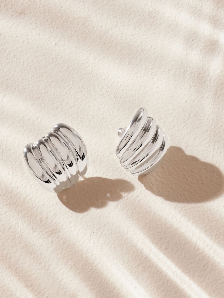 Silver Tone Stainless Steel Curved Ridge Stud Earrings - Image 1 of 10