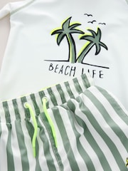 blanco/verde - Conjunto de pantalones cortos y camiseta con diseño de protección solar (3 meses - 7 años) - Imagen 4 de 5