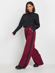 PixieGirl Petite Burgundy Red Side Stripe Contrast Wide Leg Trousers - Image 1 of 6